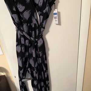 Floral jumpsuit with tie waist. NWT